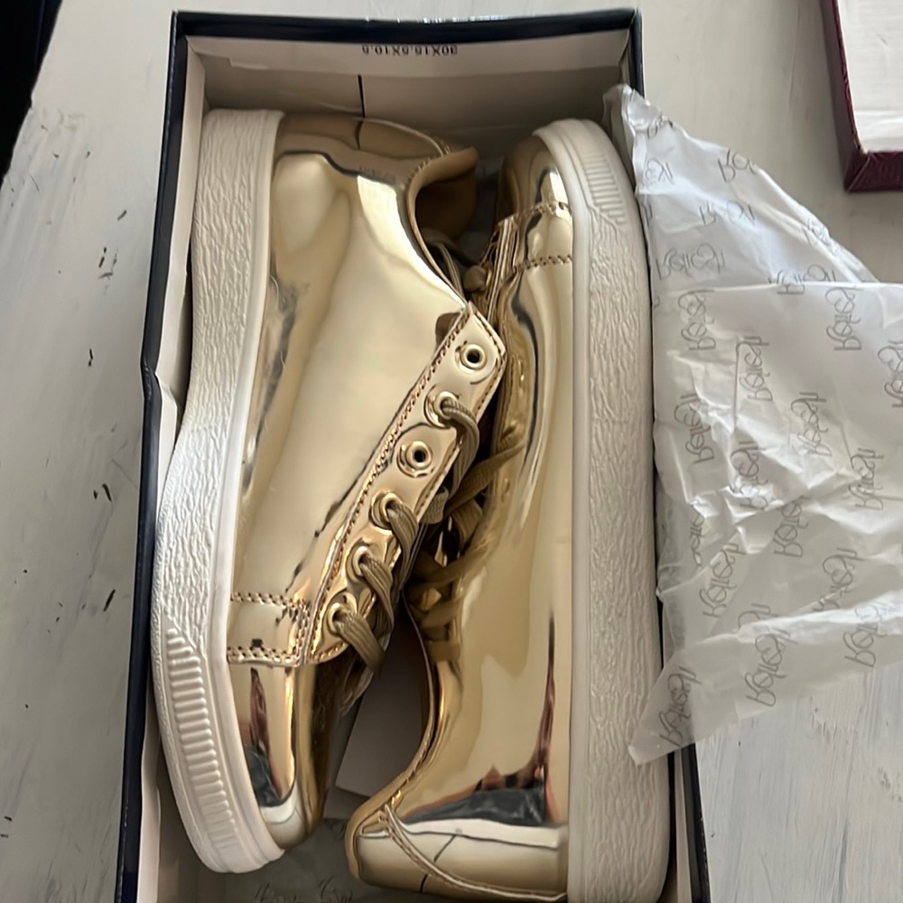 New in box fashion sneakers.  Metallic gold. Size 8.5 true to size.